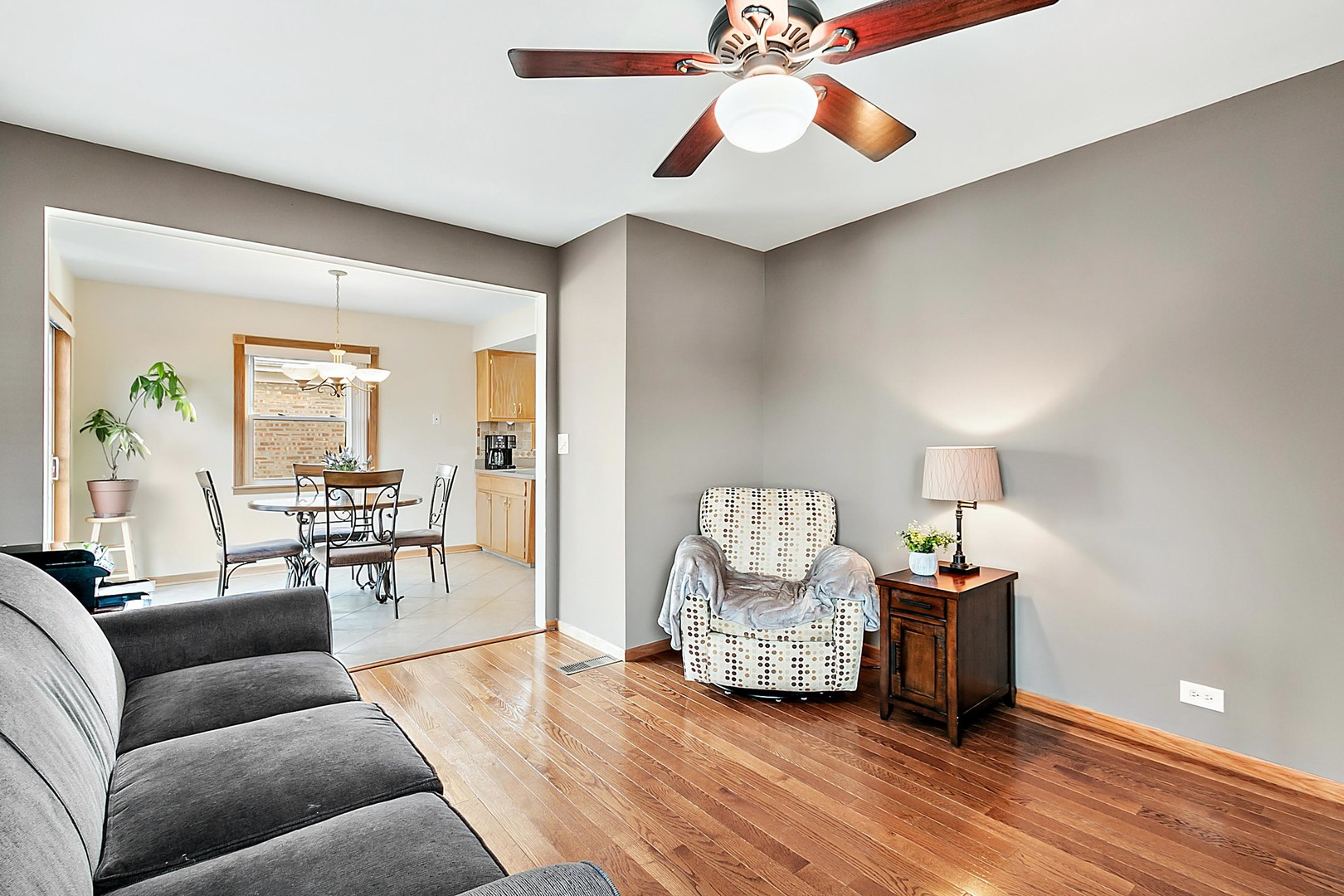 4031 Custer Avenue Lyons, IL 60534 - Photo 6 of 19 a living room with furniture and wooden floor