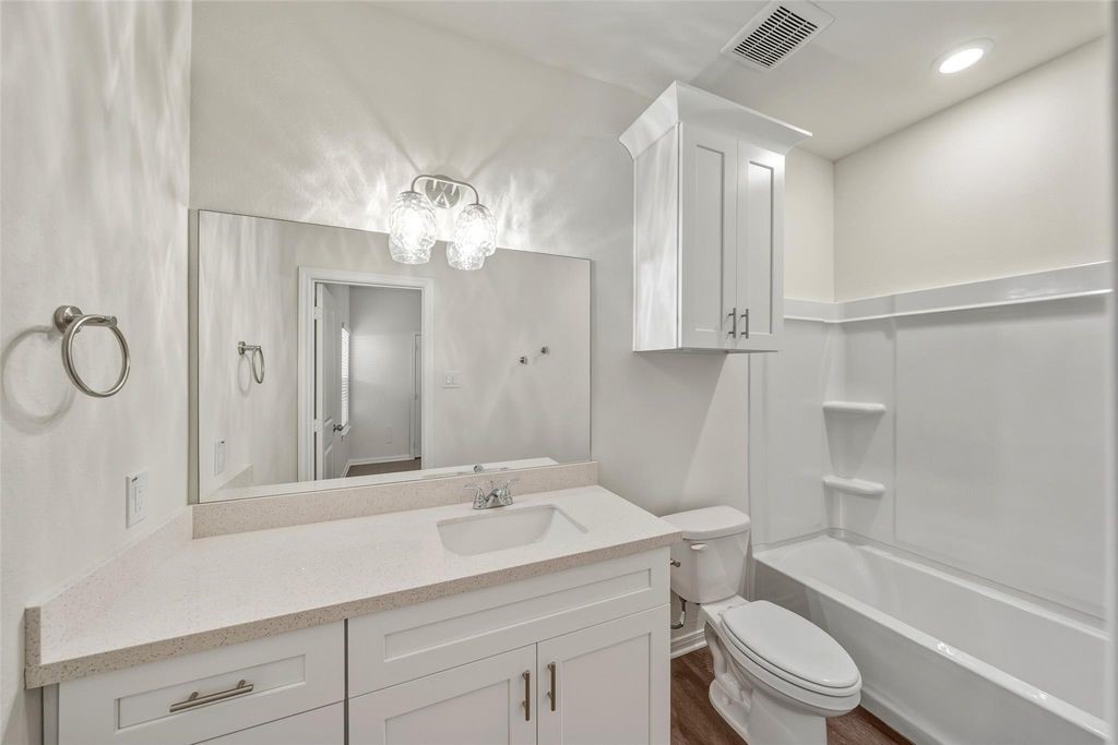 708 West Dallas Street Conroe, TX 77301 - Photo 16 of 19 Image showcases finishes and condition. Floor plan may vary.