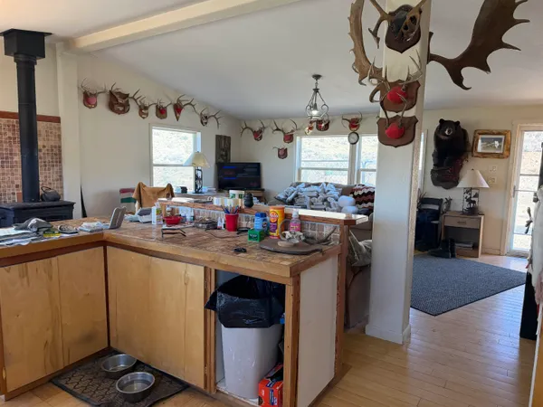 a kitchen with cabinets a sink and a stove
