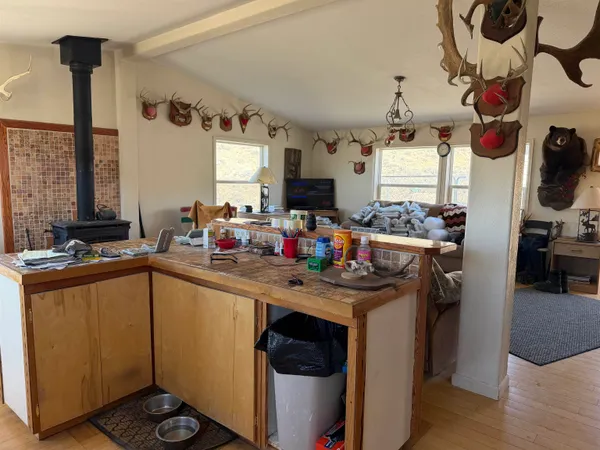 a kitchen with a sink cabinets and window