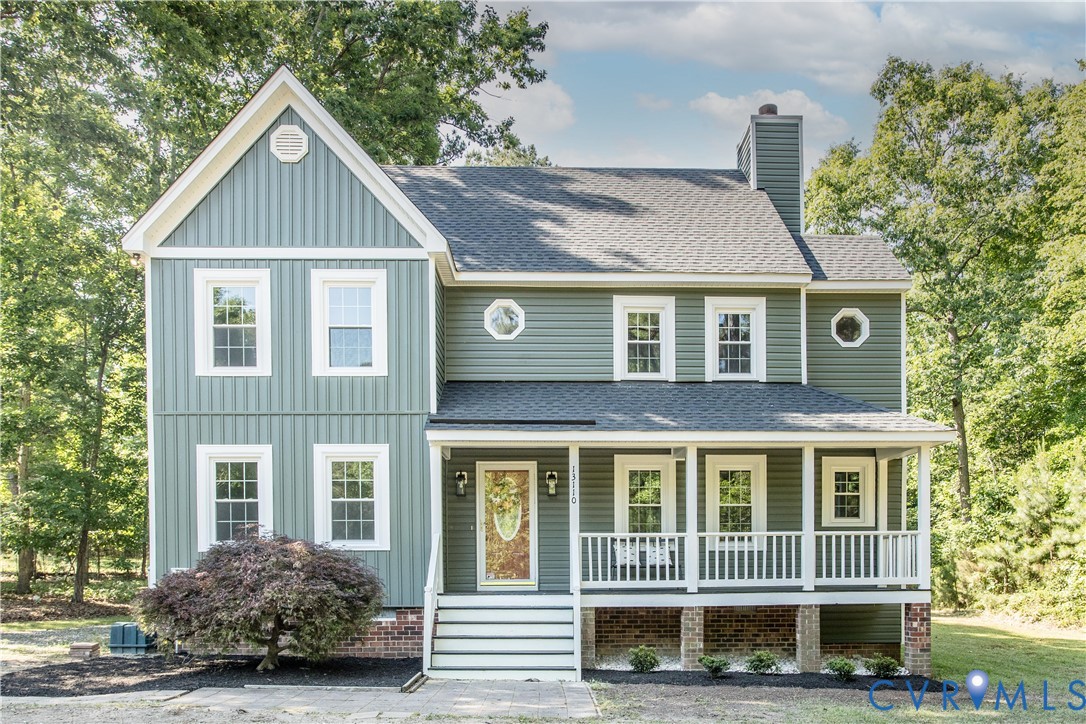 13110 Hensley Road Midlothian, VA 23112 - Photo 1 of 24 a front view of a house with a yard