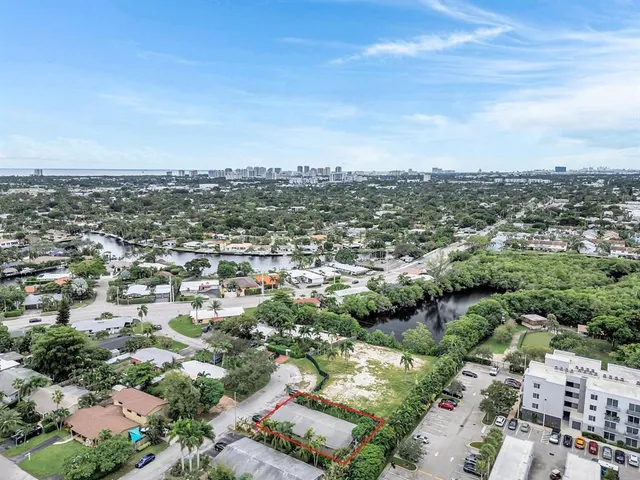 an aerial view of a city with lots of residential buildings