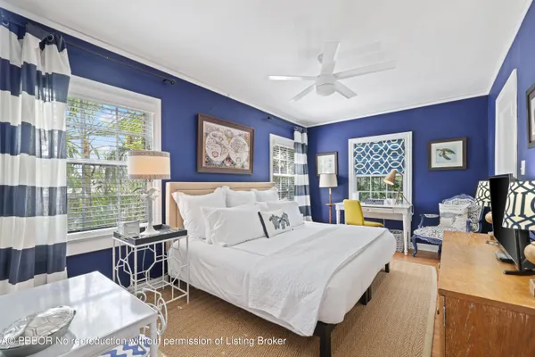 a view of an chair and table in the balcony