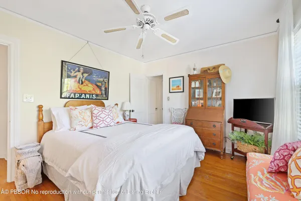 a view of a chairs and table in the balcony