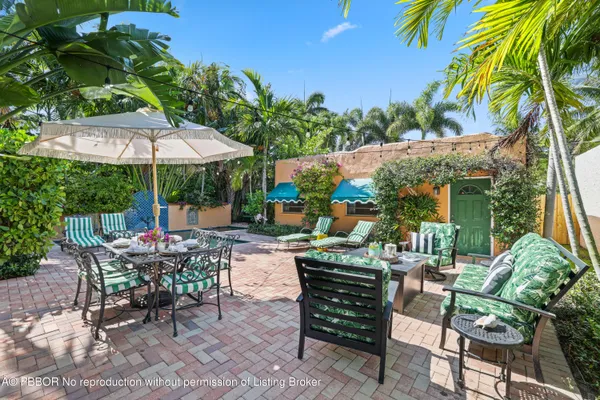 a utility room with sink dryer and washer