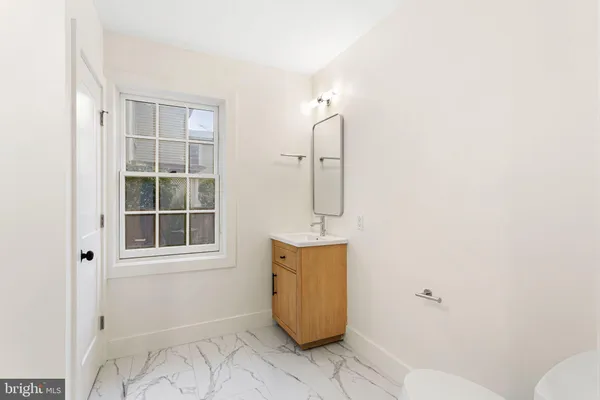 a bathroom with a sink and a toilet