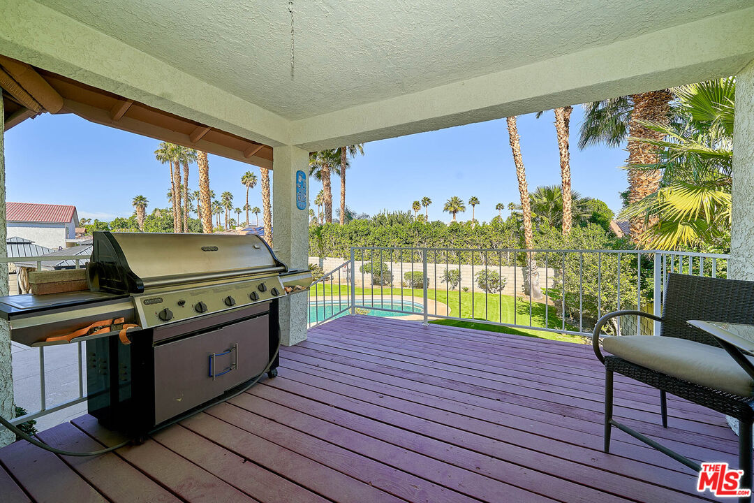 68920 Minerva Road Cathedral City, CA 92234 - Photo 15 of 49 a view of a living room and floor to ceiling window