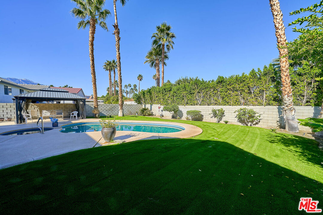 68920 Minerva Road Cathedral City, CA 92234 - Photo 21 of 49 a view of a house with a big yard