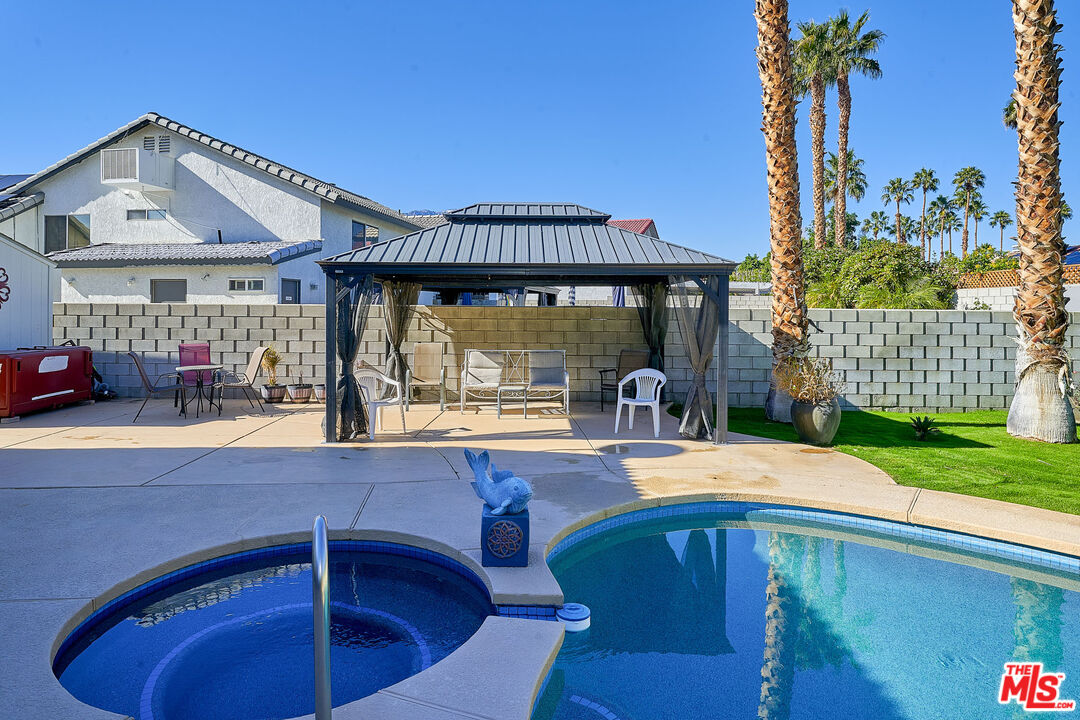 68920 Minerva Road Cathedral City, CA 92234 - Photo 22 of 49 a outdoor view with a sitting space