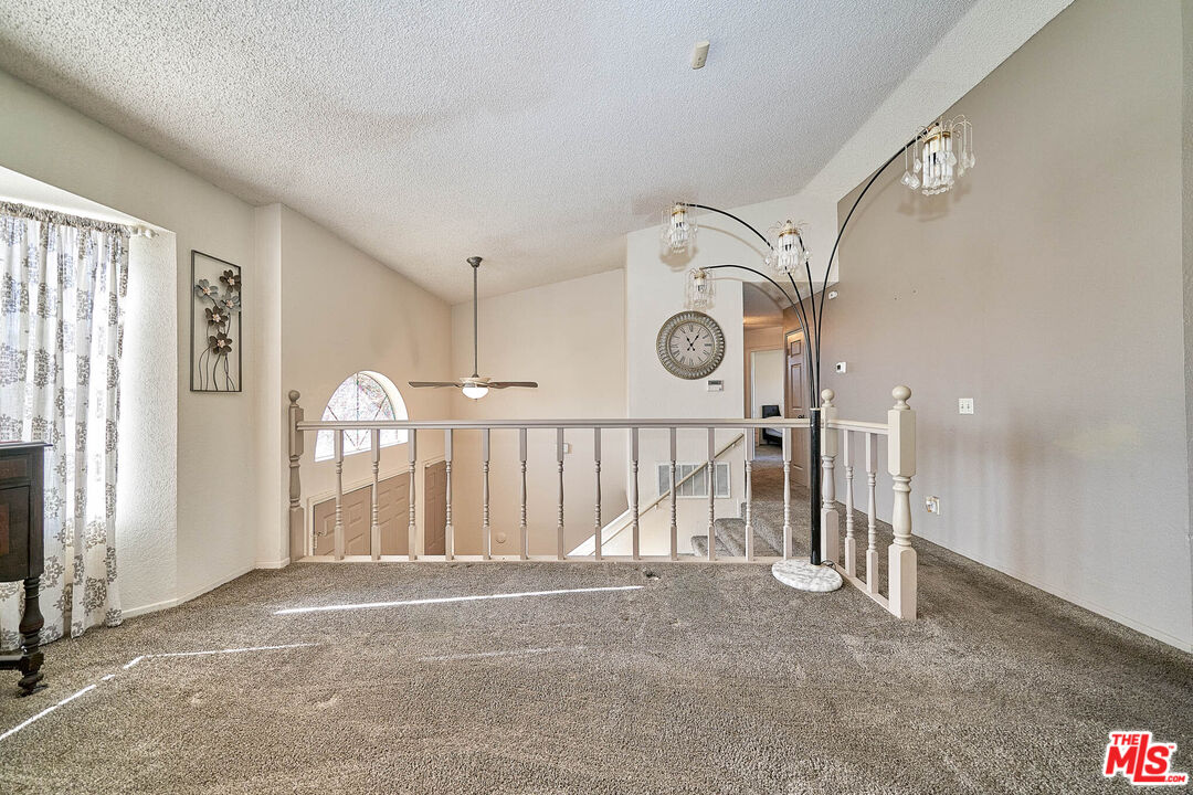 68920 Minerva Road Cathedral City, CA 92234 - Photo 7 of 49 a view of a hallway with a fan