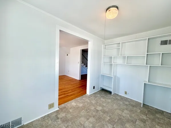 a kitchen with stainless steel appliances a stove a sink and a refrigerator