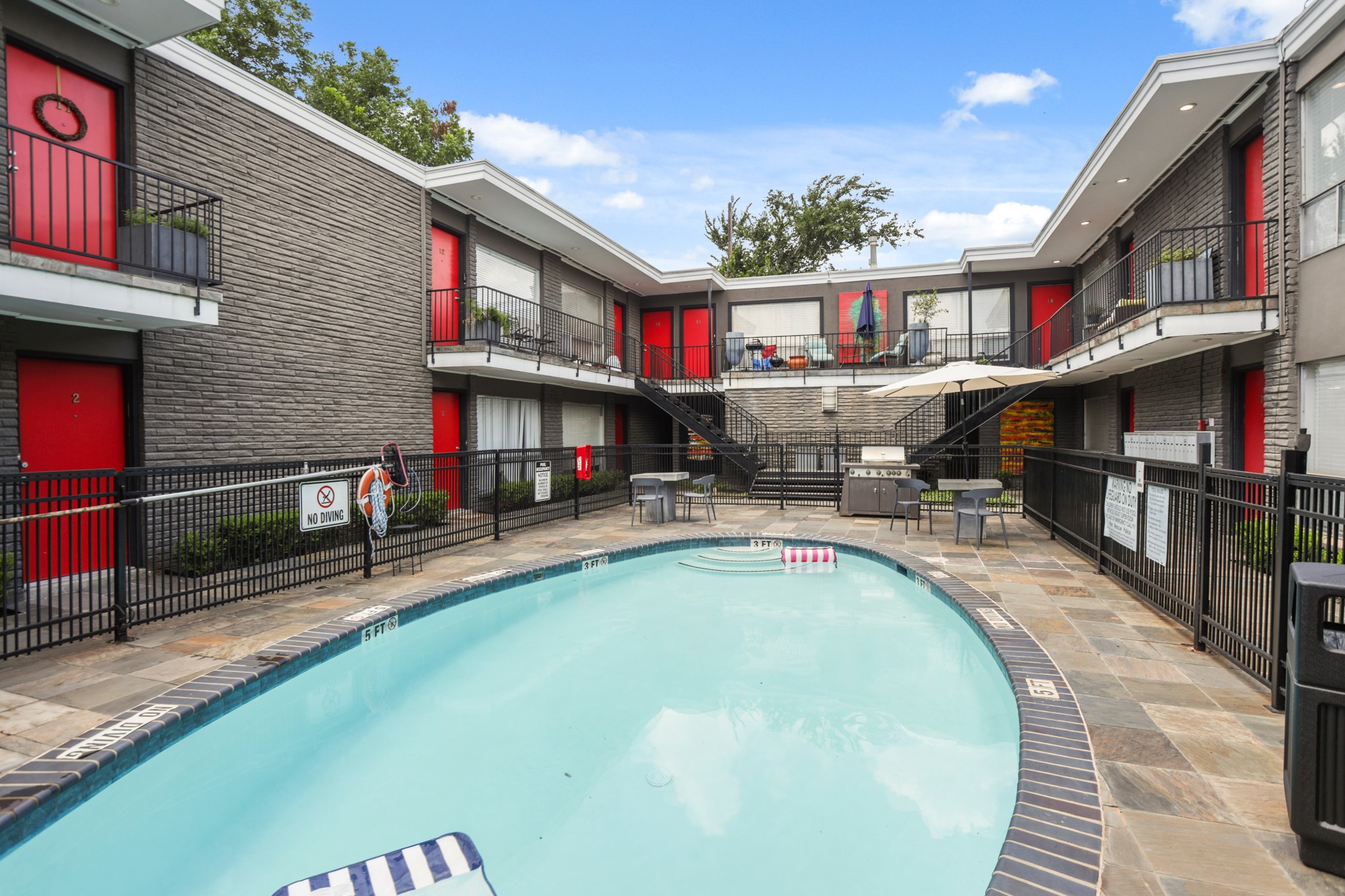 3602 Garrott Street, Unit 12 Houston, TX 77006 - Photo 32 of 34 Units overlook the stylish pool for a glamourous lifestyle.