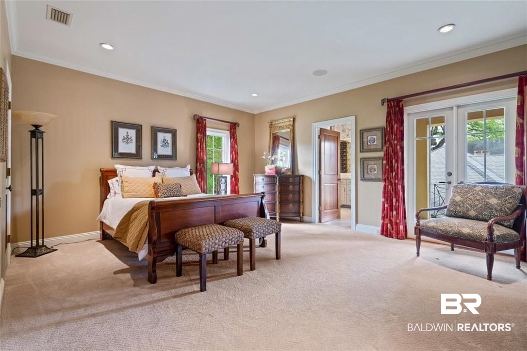 4 Chancery Court Mobile, AL 36608 - Photo 32 of 54 Carpeted bedroom featuring ornamental molding, multiple windows, access to exterior, and french doors