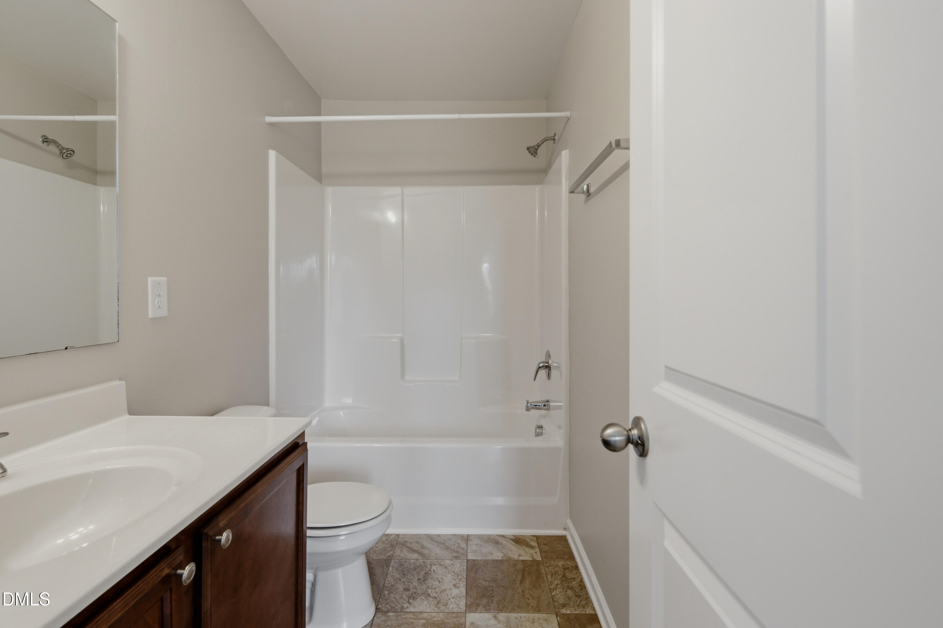 508 Directive Drive Hope Mills, NC 28348 - Photo 13 of 17 a bathroom with a sink a toilet and shower