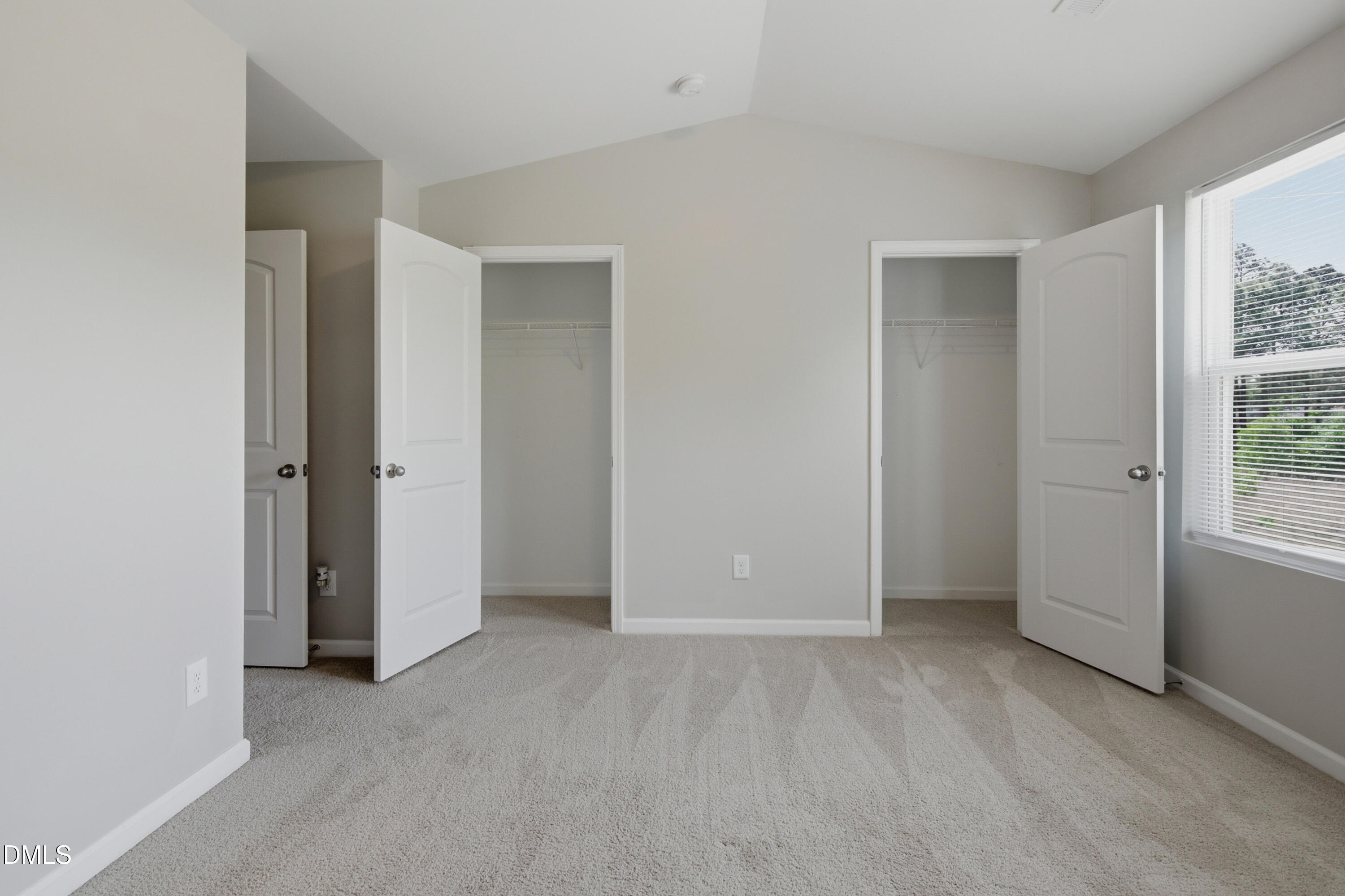 508 Directive Drive Hope Mills, NC 28348 - Photo 15 of 17 an empty room with windows and closet