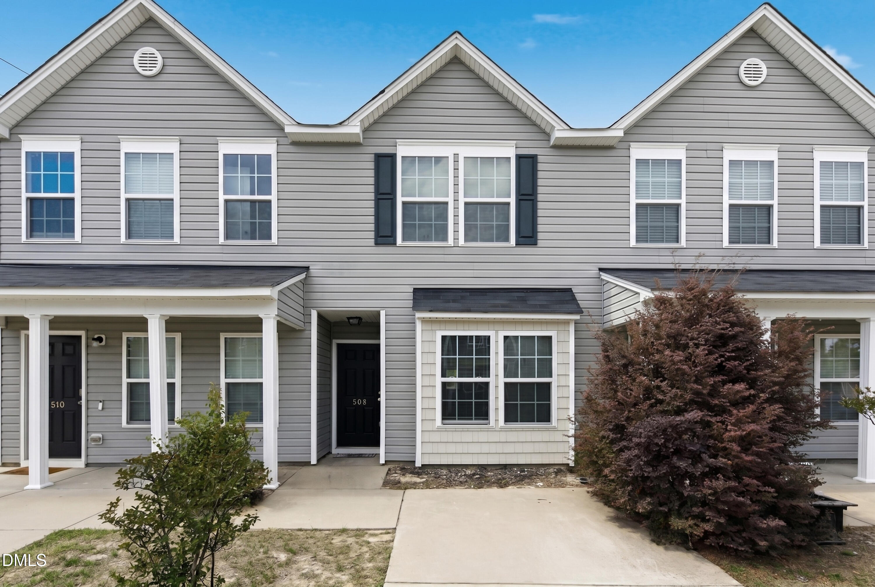 508 Directive Drive Hope Mills, NC 28348 - Photo 17 of 17 front view of a house and a yard