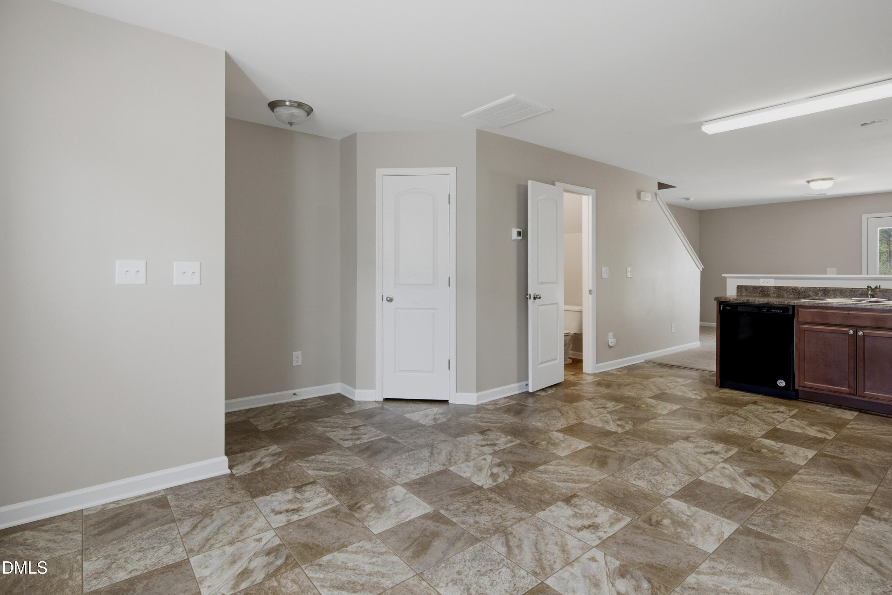 508 Directive Drive Hope Mills, NC 28348 - Photo 4 of 17 a view of a kitchen with a sink and a fireplace