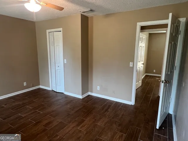 a view of livingroom and hardwood floor