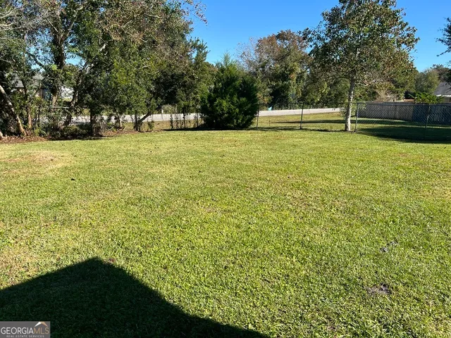 a view of an outdoor space and swimming pool