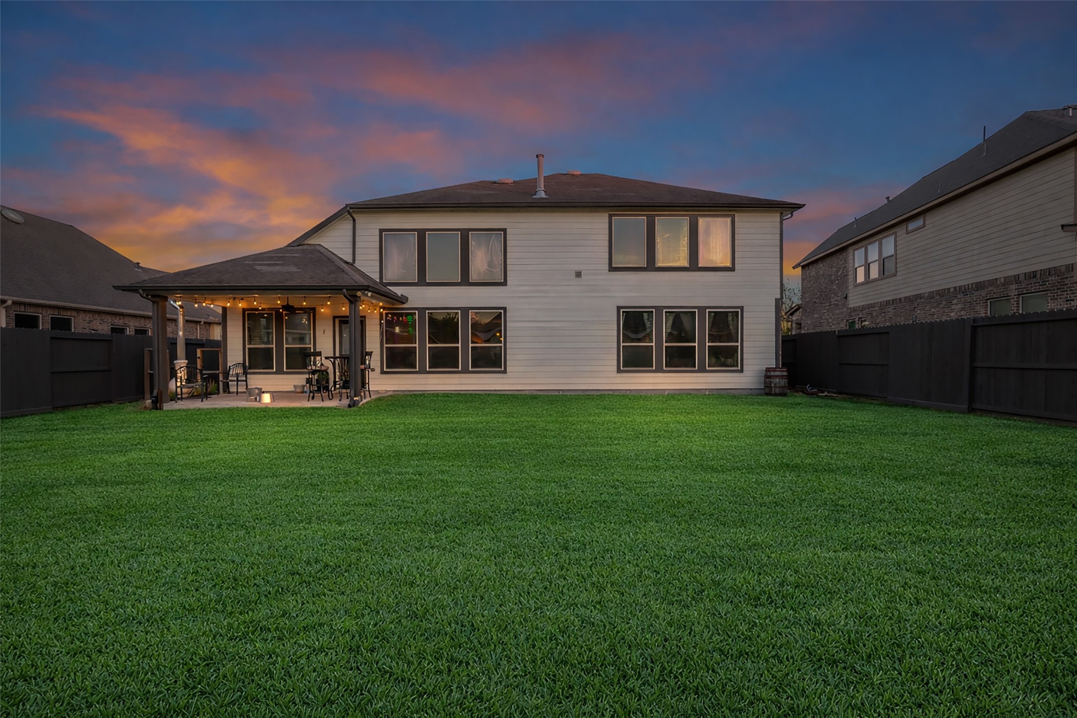 12602 Spellbrook Point Lane Tomball, TX 77377 - Photo 11 of 47 a front view of a house with a yard and green space