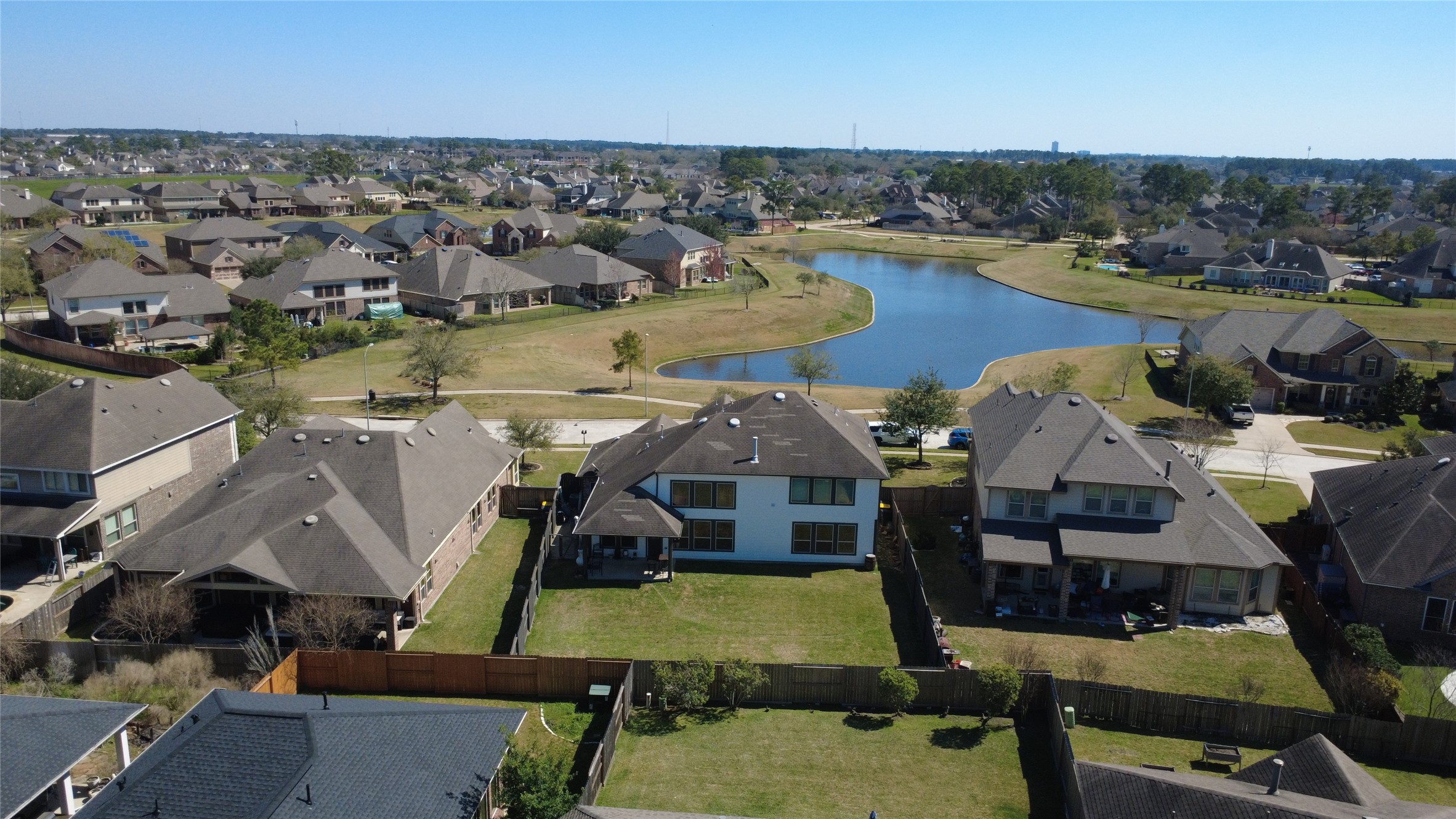 12602 Spellbrook Point Lane Tomball, TX 77377 - Photo 17 of 47 an aerial view of a house with swimming pool and outdoor space