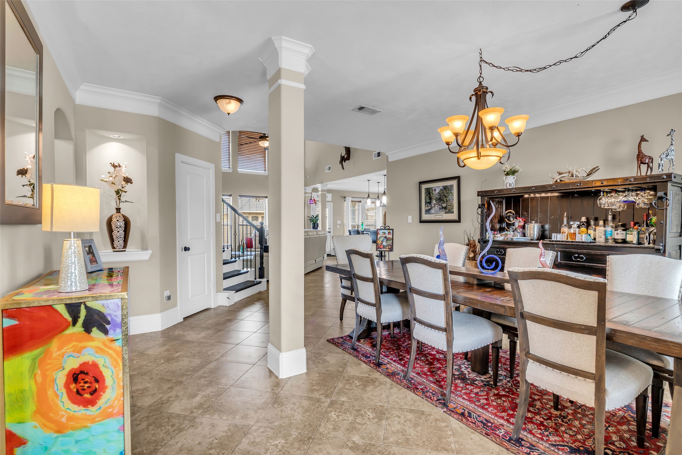 12602 Spellbrook Point Lane Tomball, TX 77377 - Photo 18 of 47 a view of a dining room with furniture and chandelier