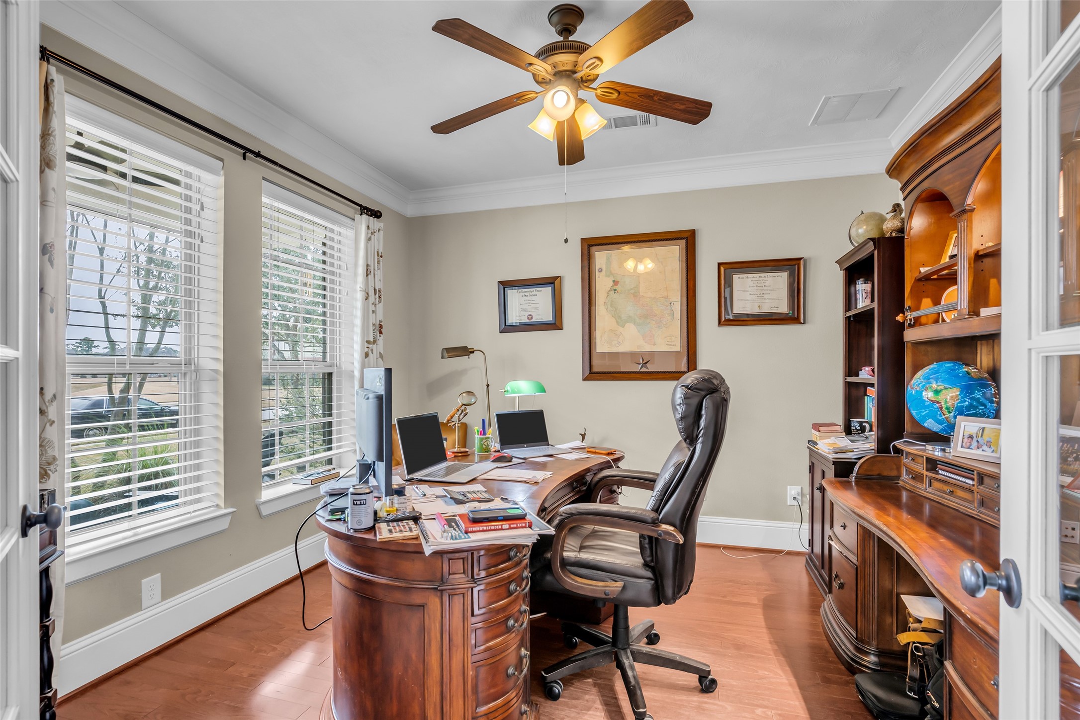 12602 Spellbrook Point Lane Tomball, TX 77377 - Photo 19 of 47 a view of a workspace with furniture and a window