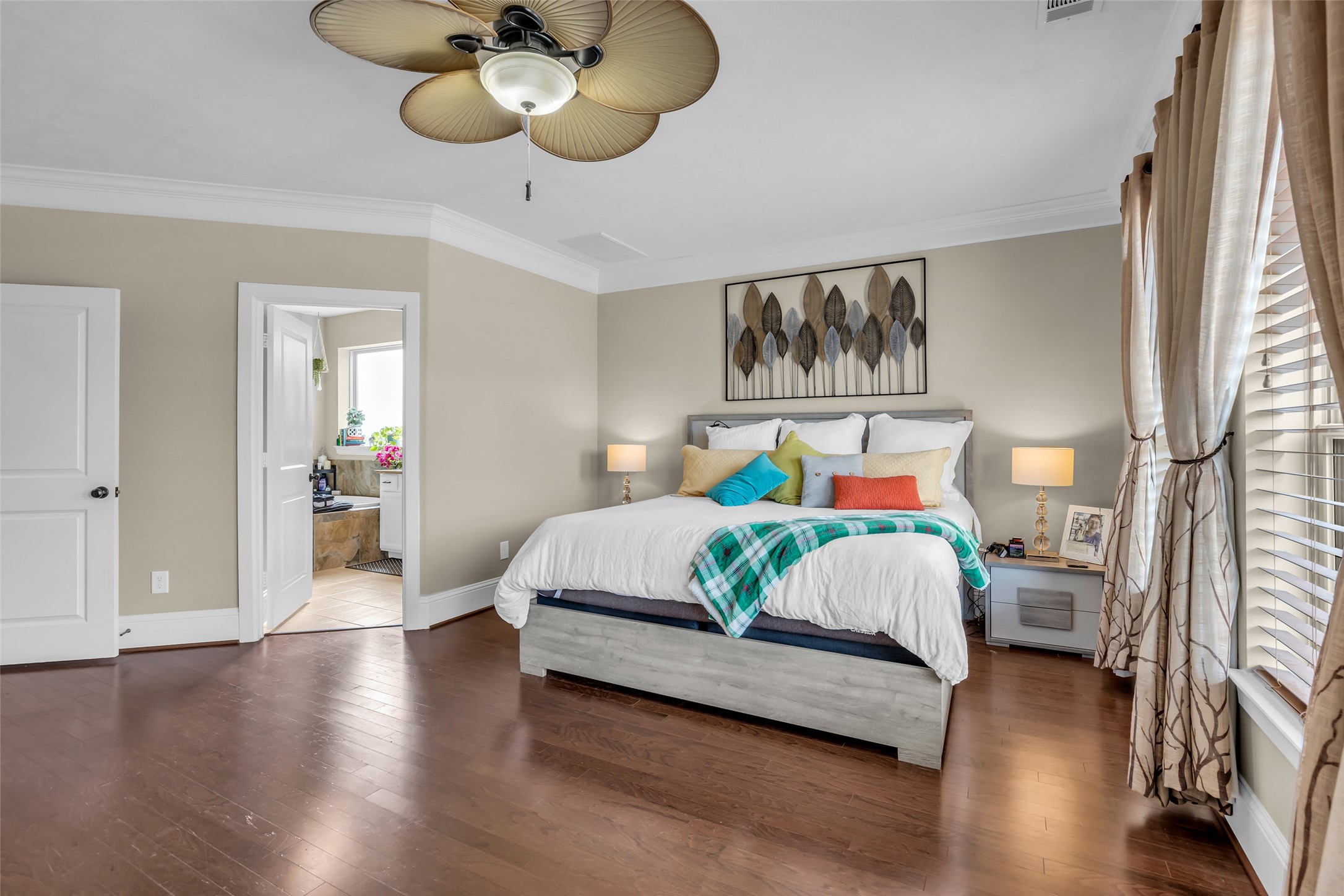 12602 Spellbrook Point Lane Tomball, TX 77377 - Photo 36 of 47 a bedroom with a bed and wooden floor