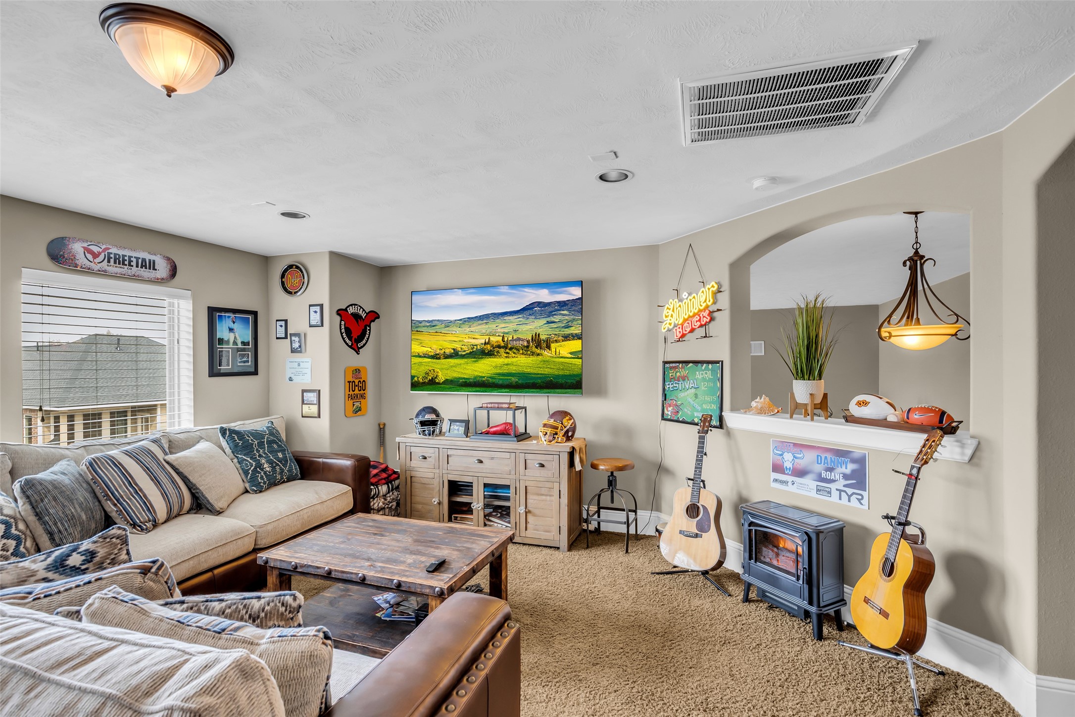12602 Spellbrook Point Lane Tomball, TX 77377 - Photo 39 of 47 a living room with furniture and a flat screen tv