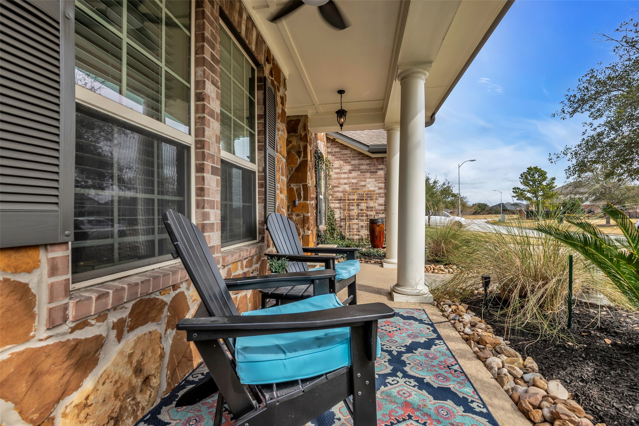 12602 Spellbrook Point Lane Tomball, TX 77377 - Photo 4 of 47 a view of balcony with two chairs and a potted plant