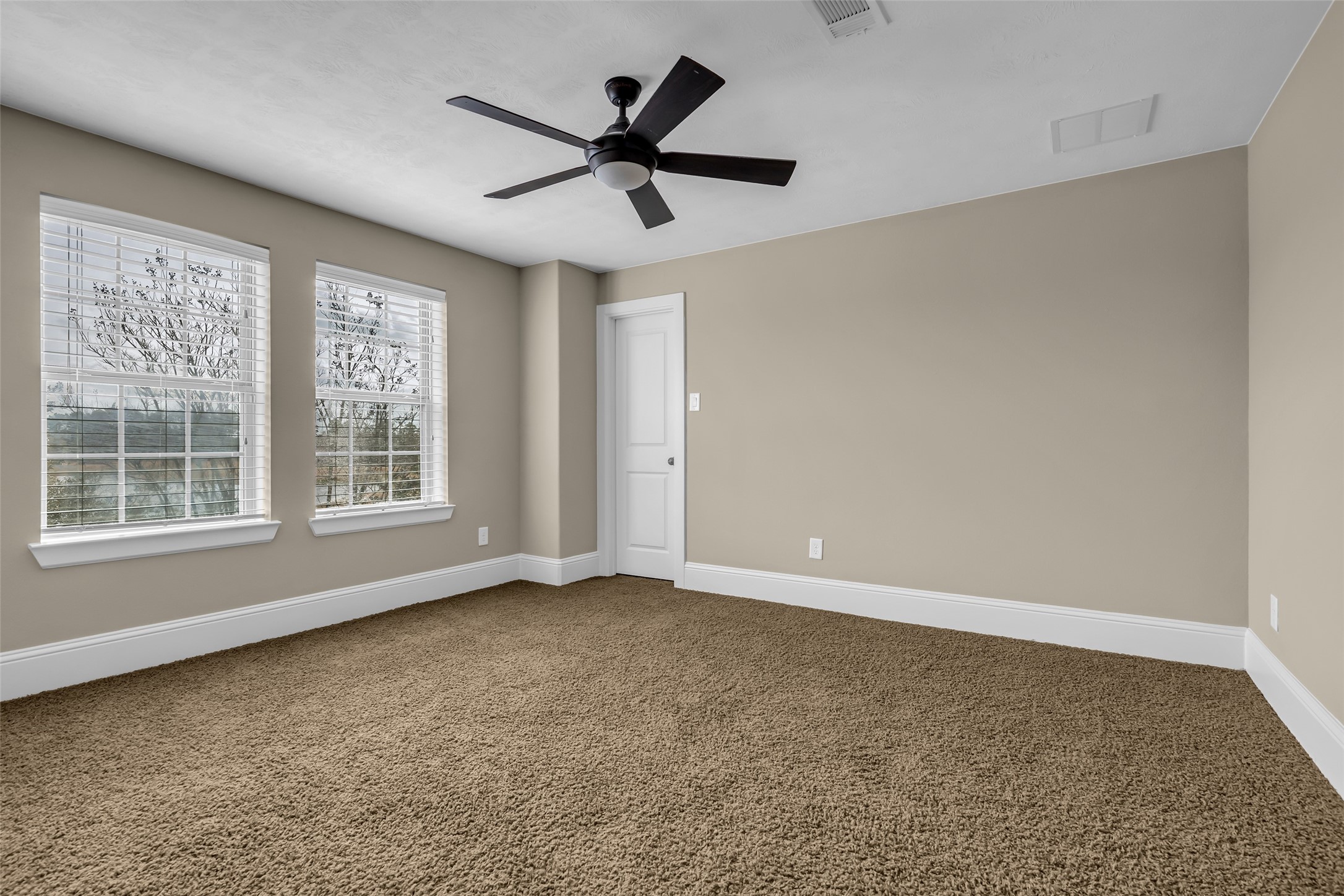 12602 Spellbrook Point Lane Tomball, TX 77377 - Photo 43 of 47 a view of an empty room with a window