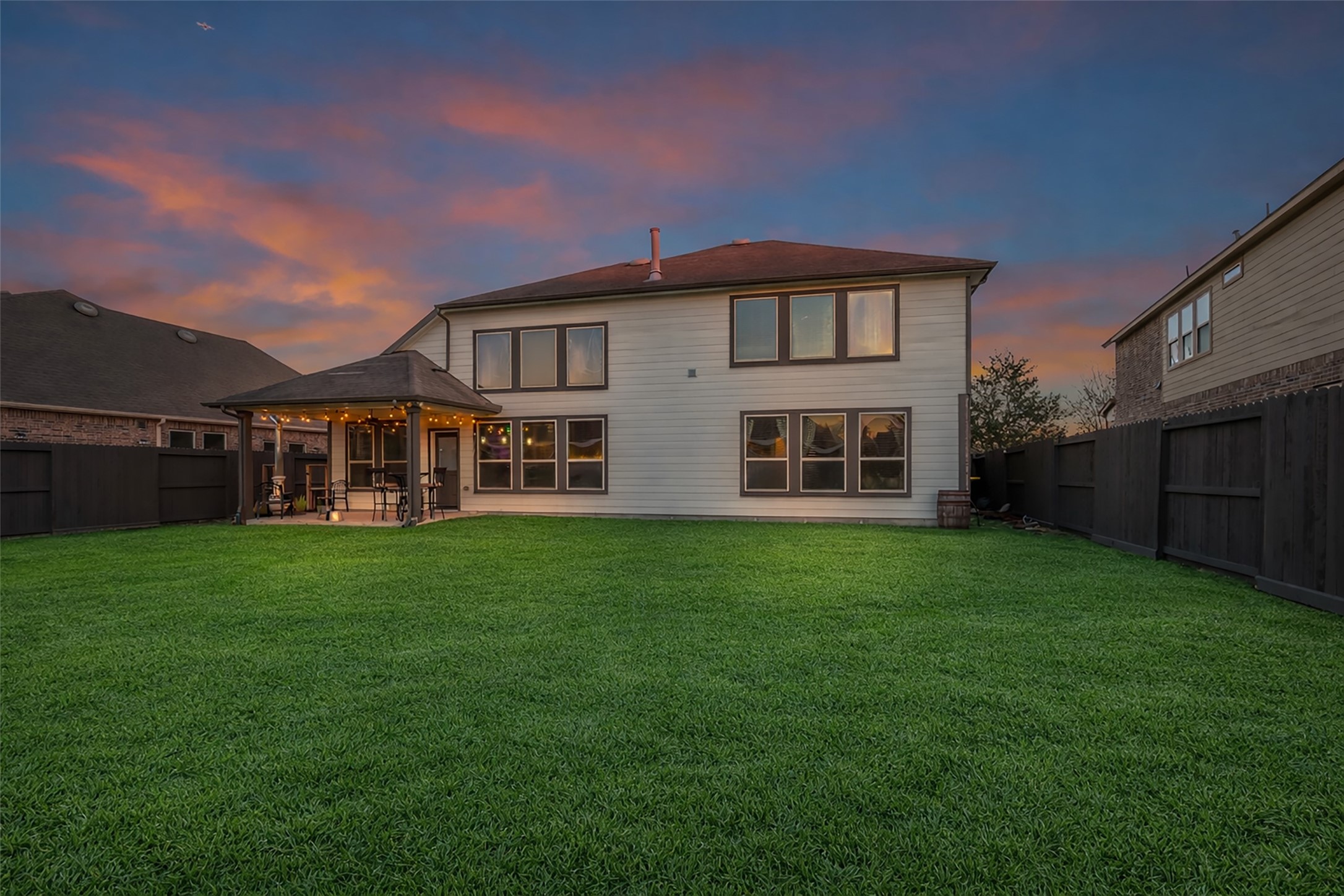 12602 Spellbrook Point Lane Tomball, TX 77377 - Photo 10 of 47 a front view of a house with a garden