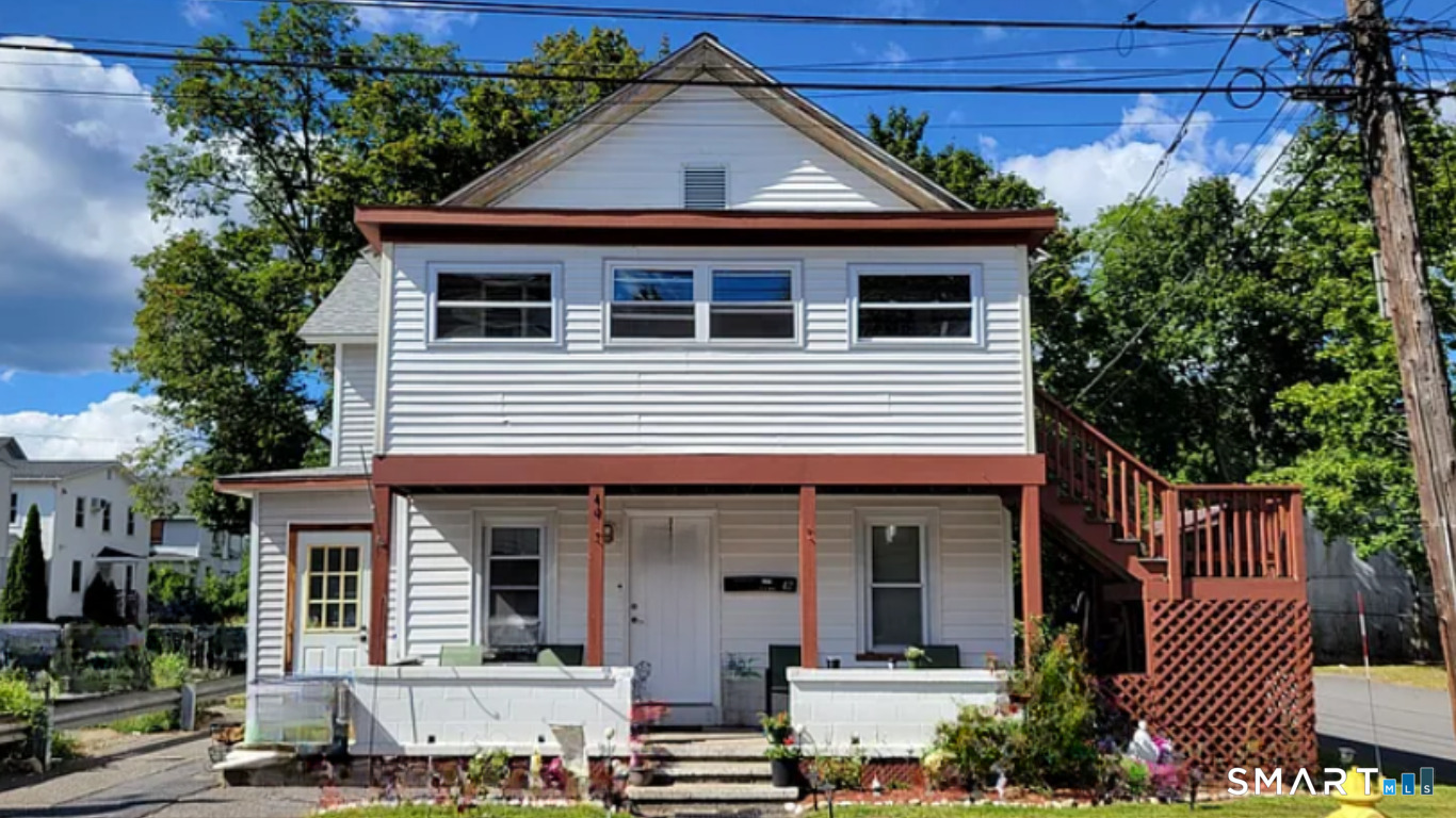 42 Pulver Street Torrington, CT 06790 - Photo 1 of 7 a front view of a house with a yard