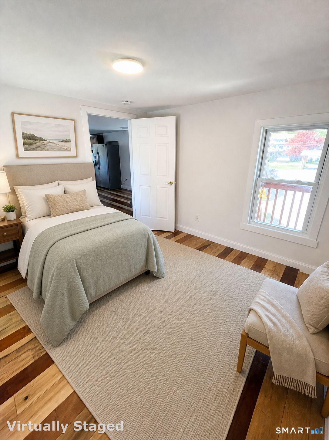 42 Pulver Street Torrington, CT 06790 - Photo 6 of 7 a bedroom with a bed and wooden floor