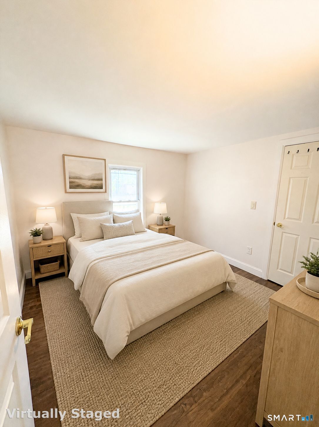 42 Pulver Street Torrington, CT 06790 - Photo 7 of 7 a bedroom with a bed and a flat screen tv