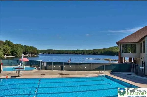 a view of swimming pool and lake view