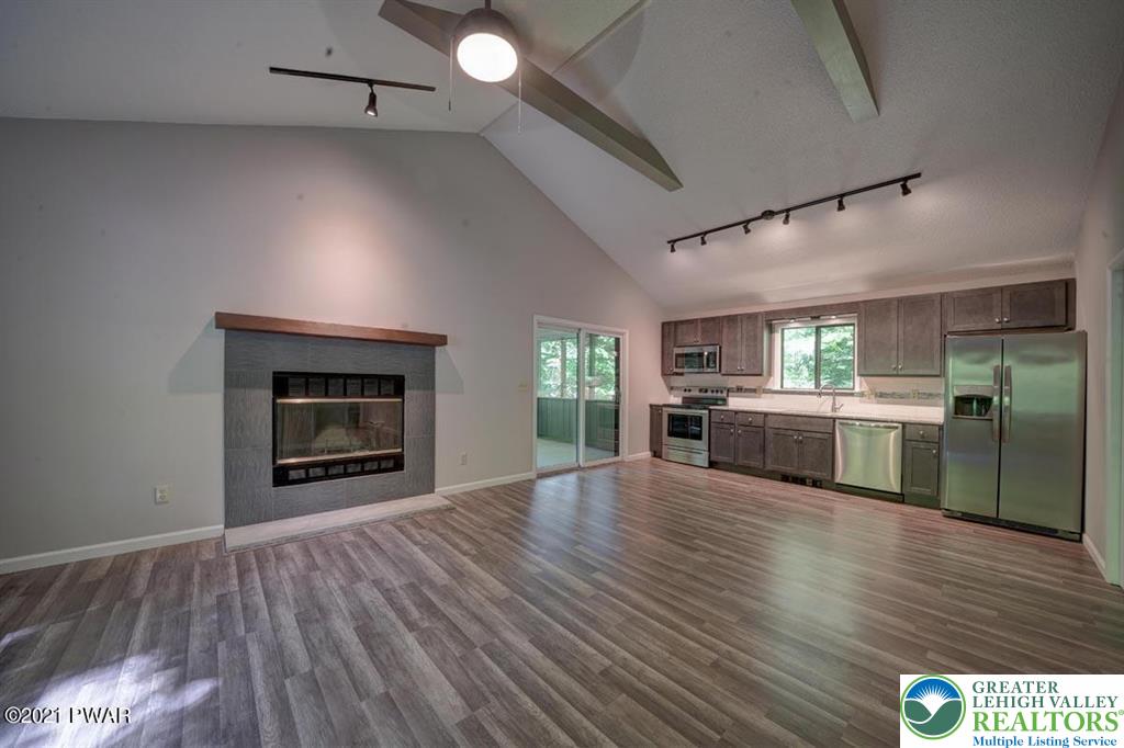 199 North Northgate Road Lake Ariel, PA 18436 - Photo 8 of 35 a open kitchen with a stove and a refrigerator