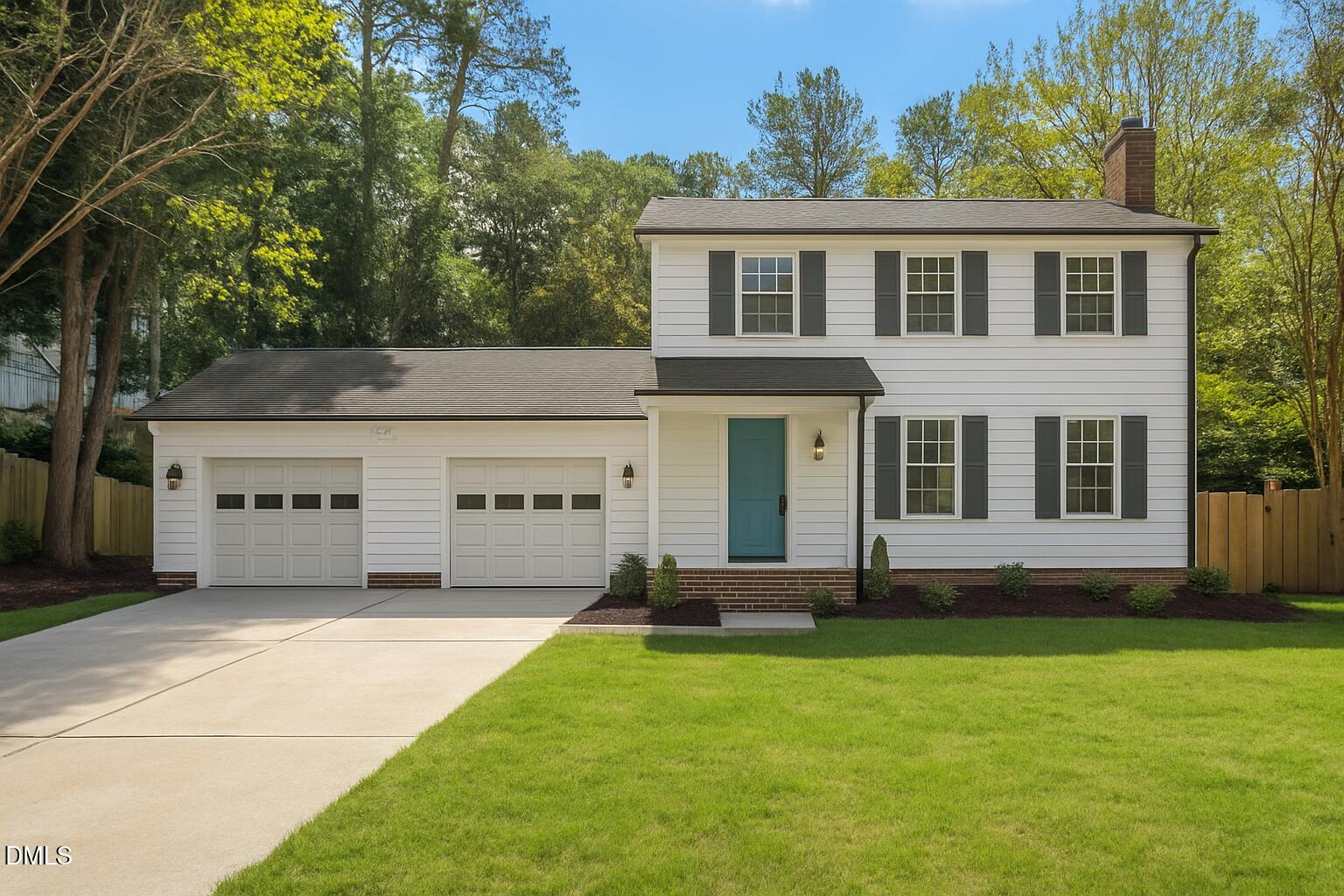 1103 Suterland Road Cary, NC 27511 - Photo 1 of 21 a front view of a house with a yard