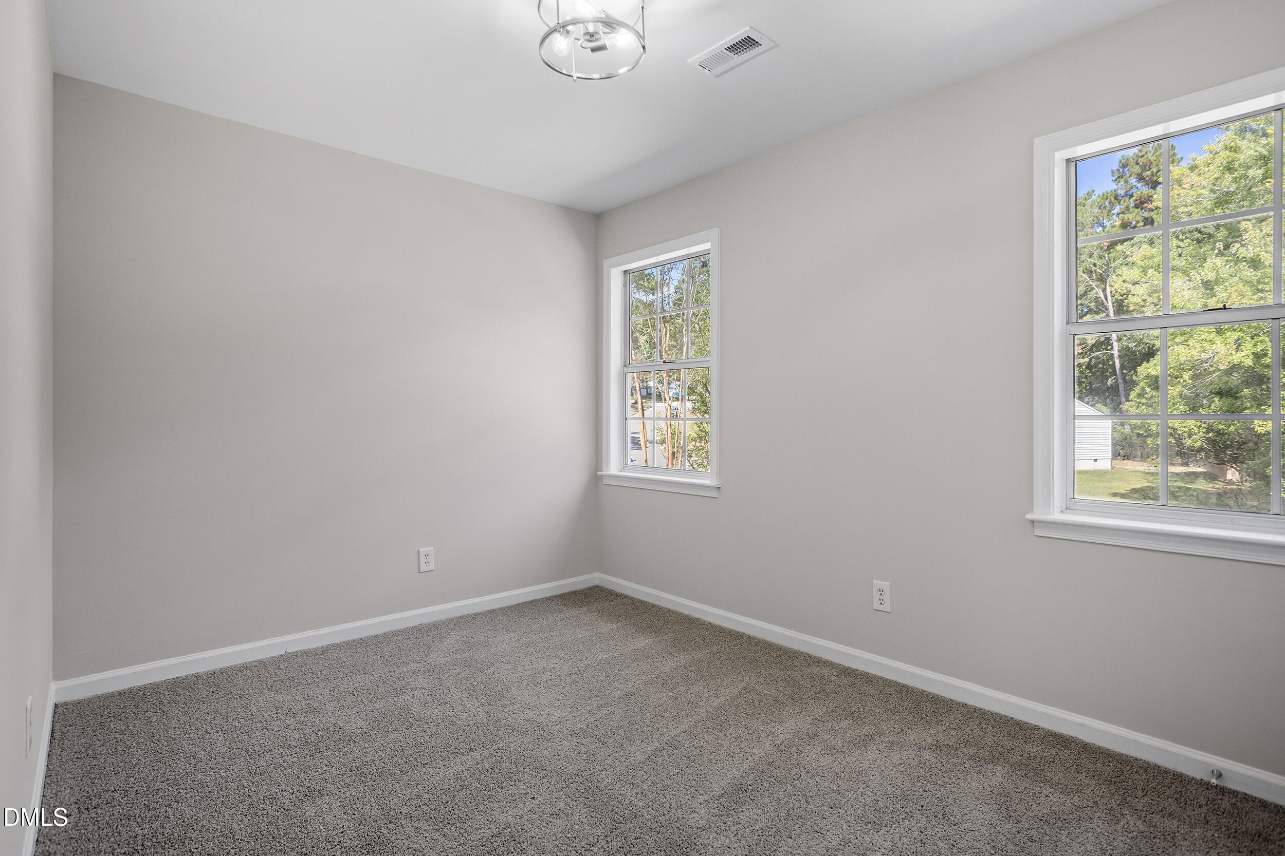 1103 Suterland Road Cary, NC 27511 - Photo 14 of 21 an empty room with a window