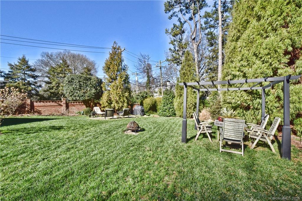 2410 Ferncliff Road Charlotte, NC 28211 - Photo 22 of 24 a view of a chair and table on the garden