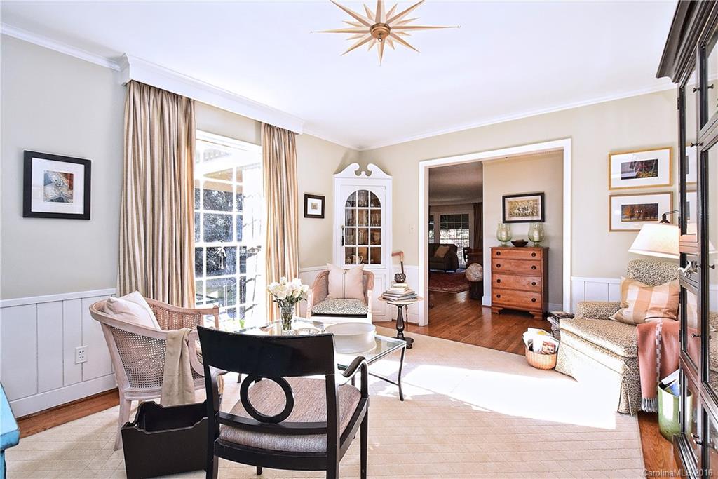 2410 Ferncliff Road Charlotte, NC 28211 - Photo 4 of 24 a view of a dining room with furniture window and wooden floor