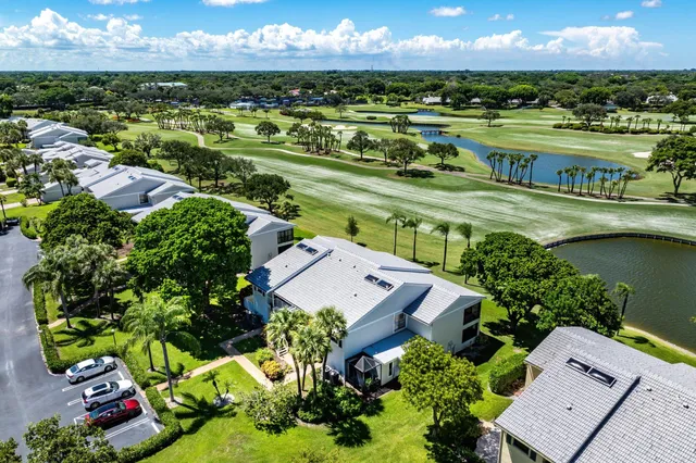a view of a dining table and chairs in patio