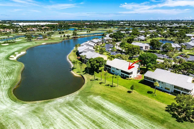 a view of a lake with a swimming pool