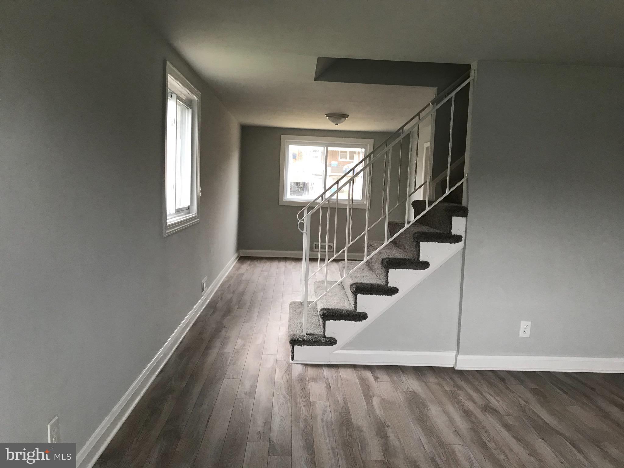 7810 Rockbourne Road Baltimore, MD 21222 - Photo 26 of 59 Living room into dining room