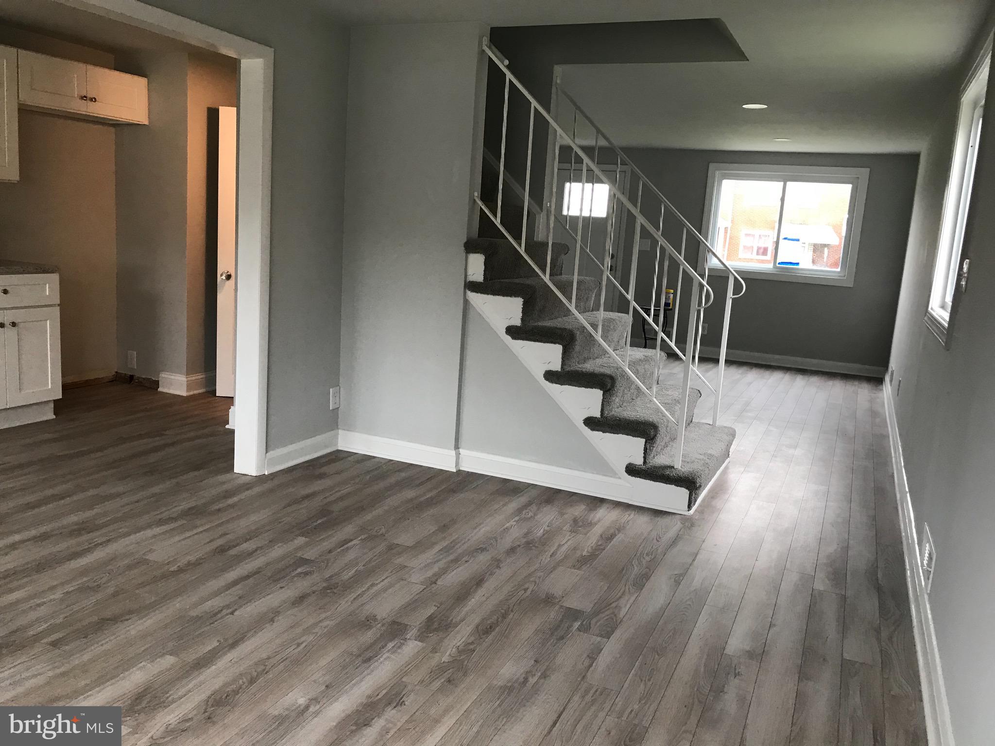 7810 Rockbourne Road Baltimore, MD 21222 - Photo 27 of 59 Dining room into living room