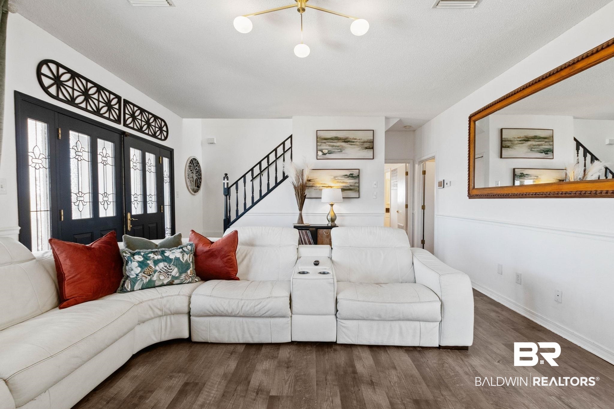 41997 Bayou Road Bay Minette, AL 36507 - Photo 18 of 68 Living area featuring stairs and wood finished floors