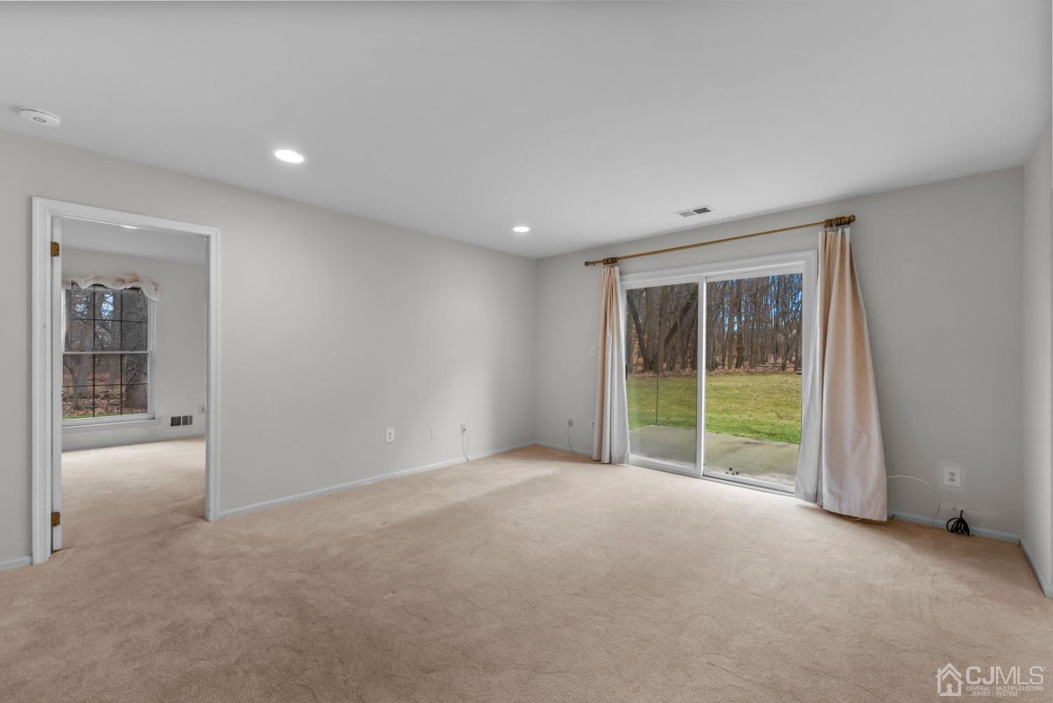 1801 Timber Oaks Road Edison, NJ 08820 - Photo 11 of 35 a view of an empty room with glass door