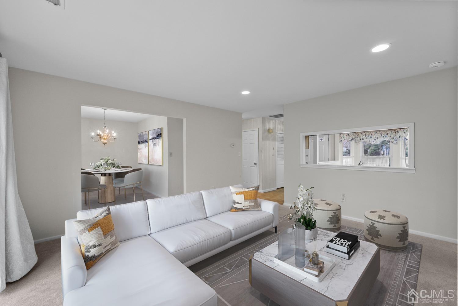 1801 Timber Oaks Road Edison, NJ 08820 - Photo 12 of 35 a living room with furniture and white walls