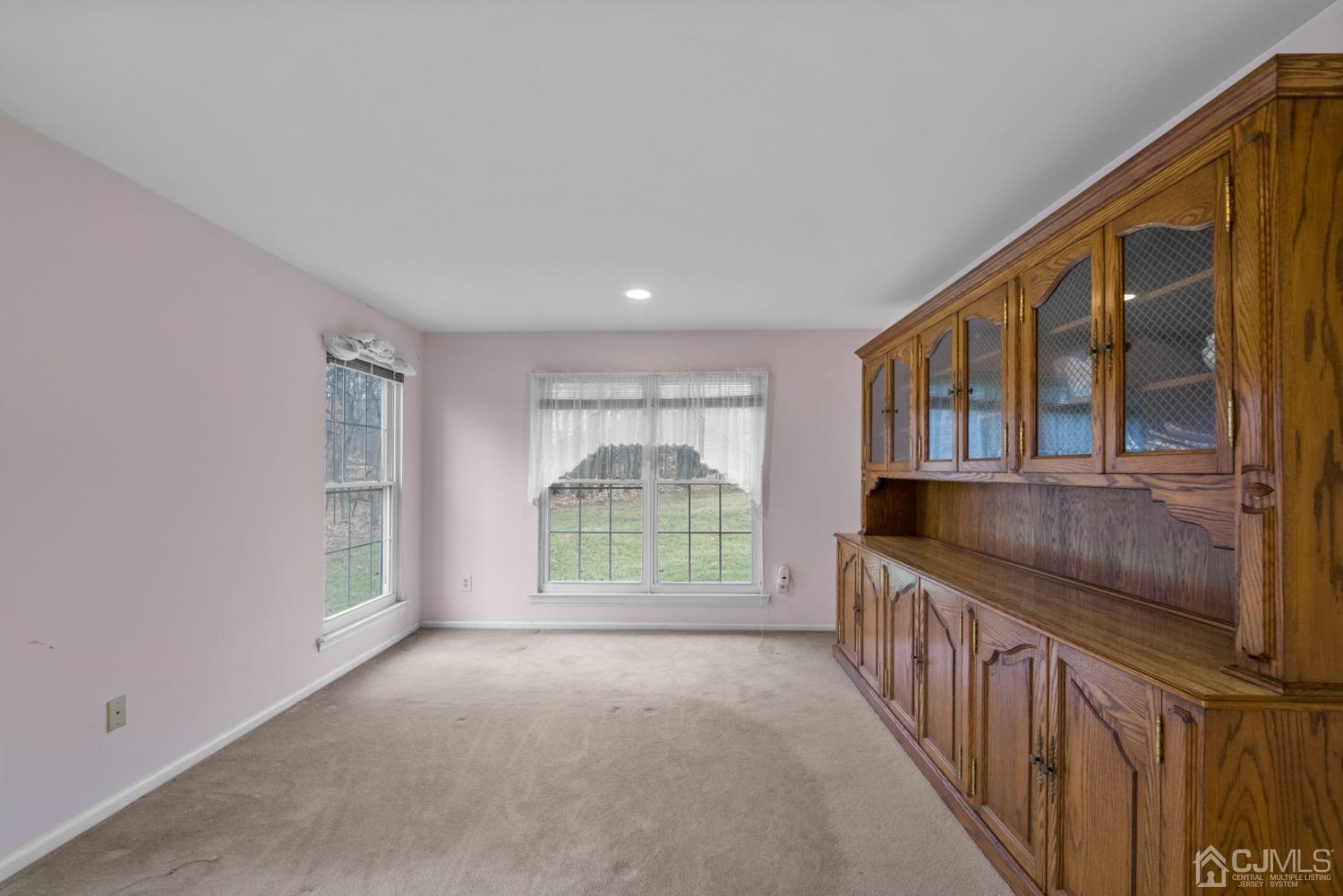 1801 Timber Oaks Road Edison, NJ 08820 - Photo 15 of 35 a view of an empty room with a balcony