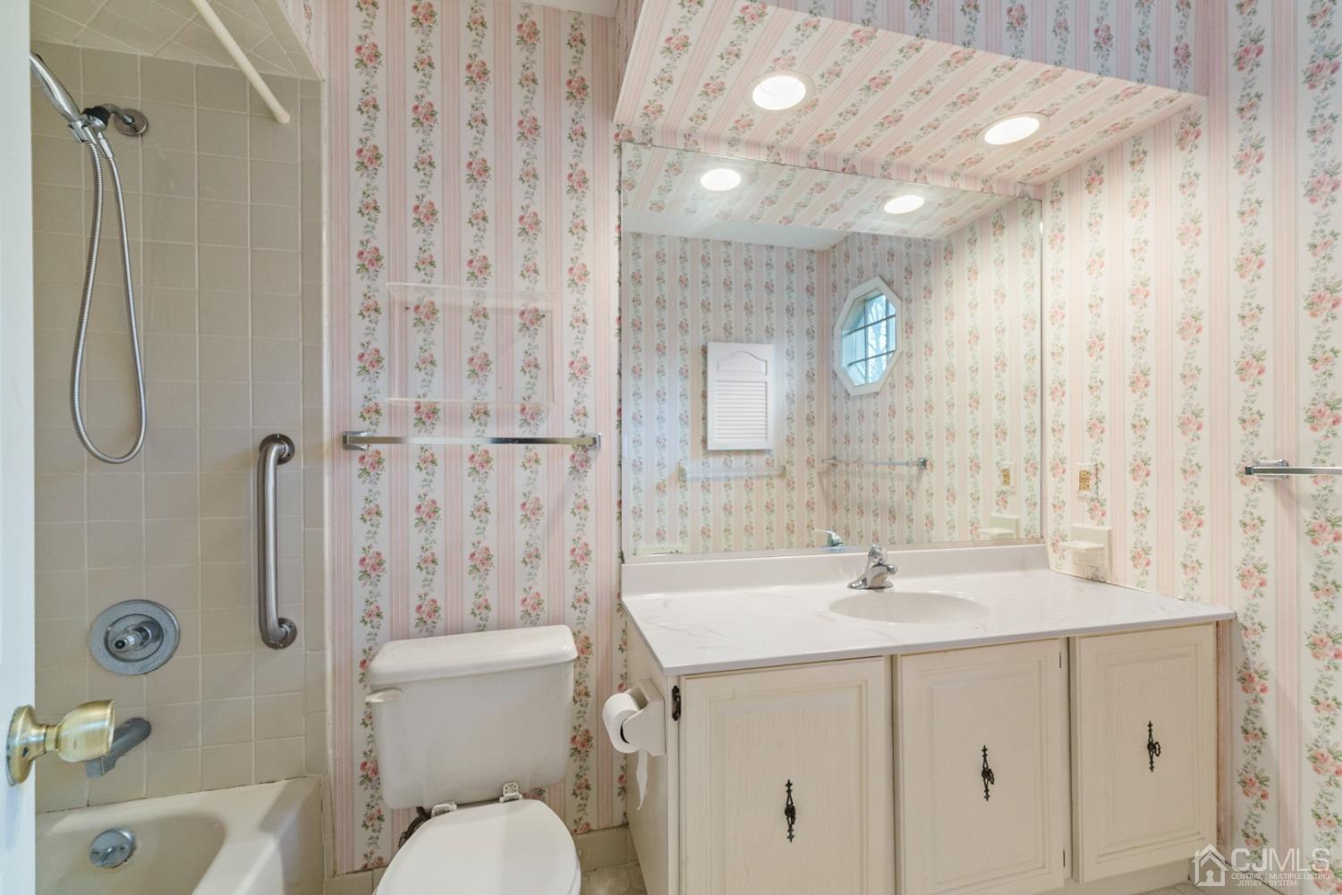 1801 Timber Oaks Road Edison, NJ 08820 - Photo 20 of 35 a bathroom with a sink a toilet and shower